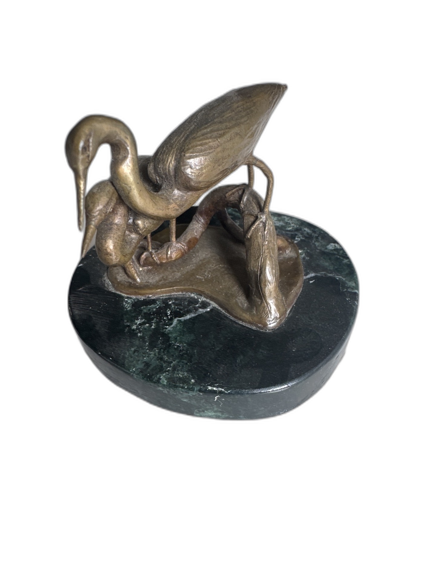 Front view of a bronze heron pair sculpture on a green marble base